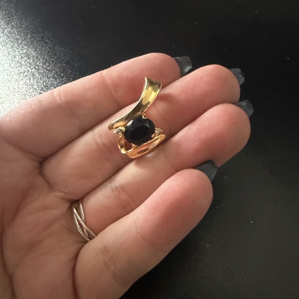 Gold Tone Black Stone Swirl Pendant